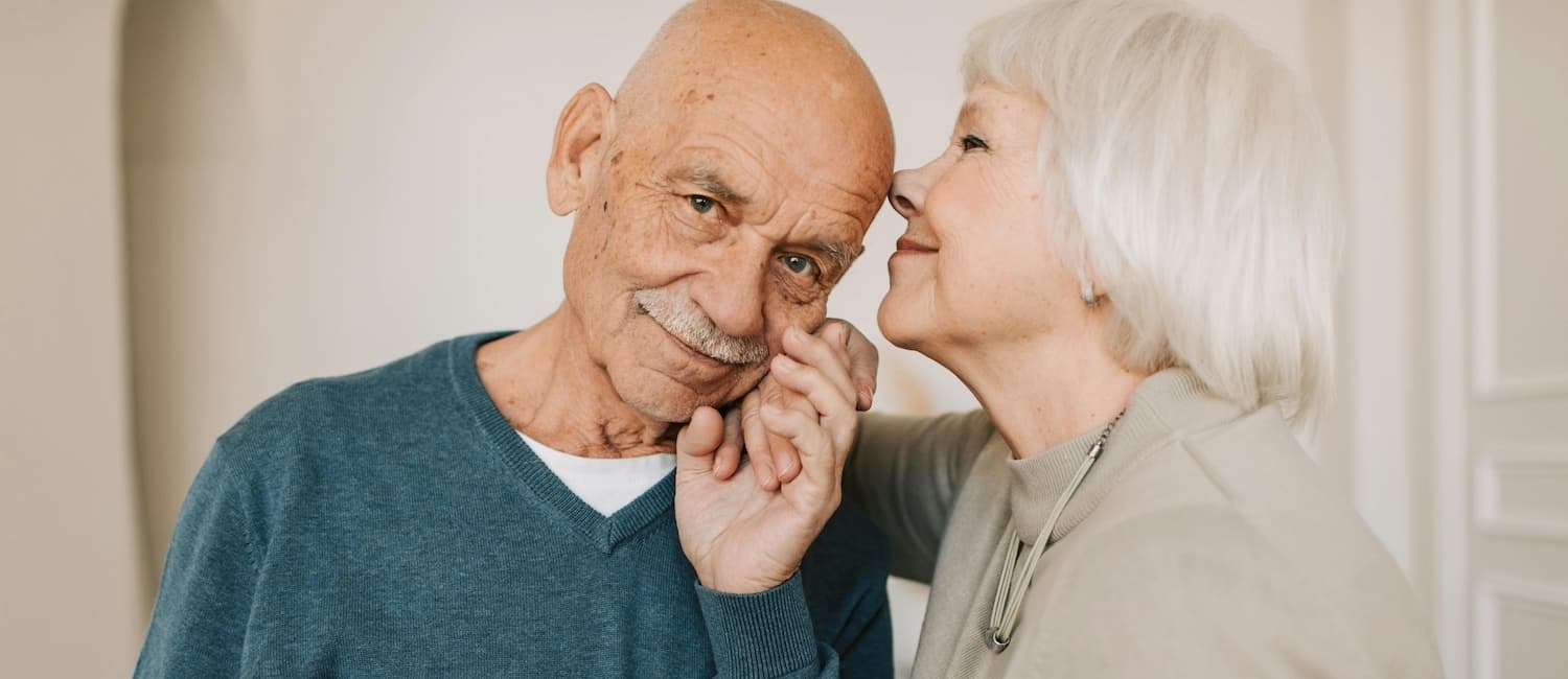 Caregiver assisting elderly person